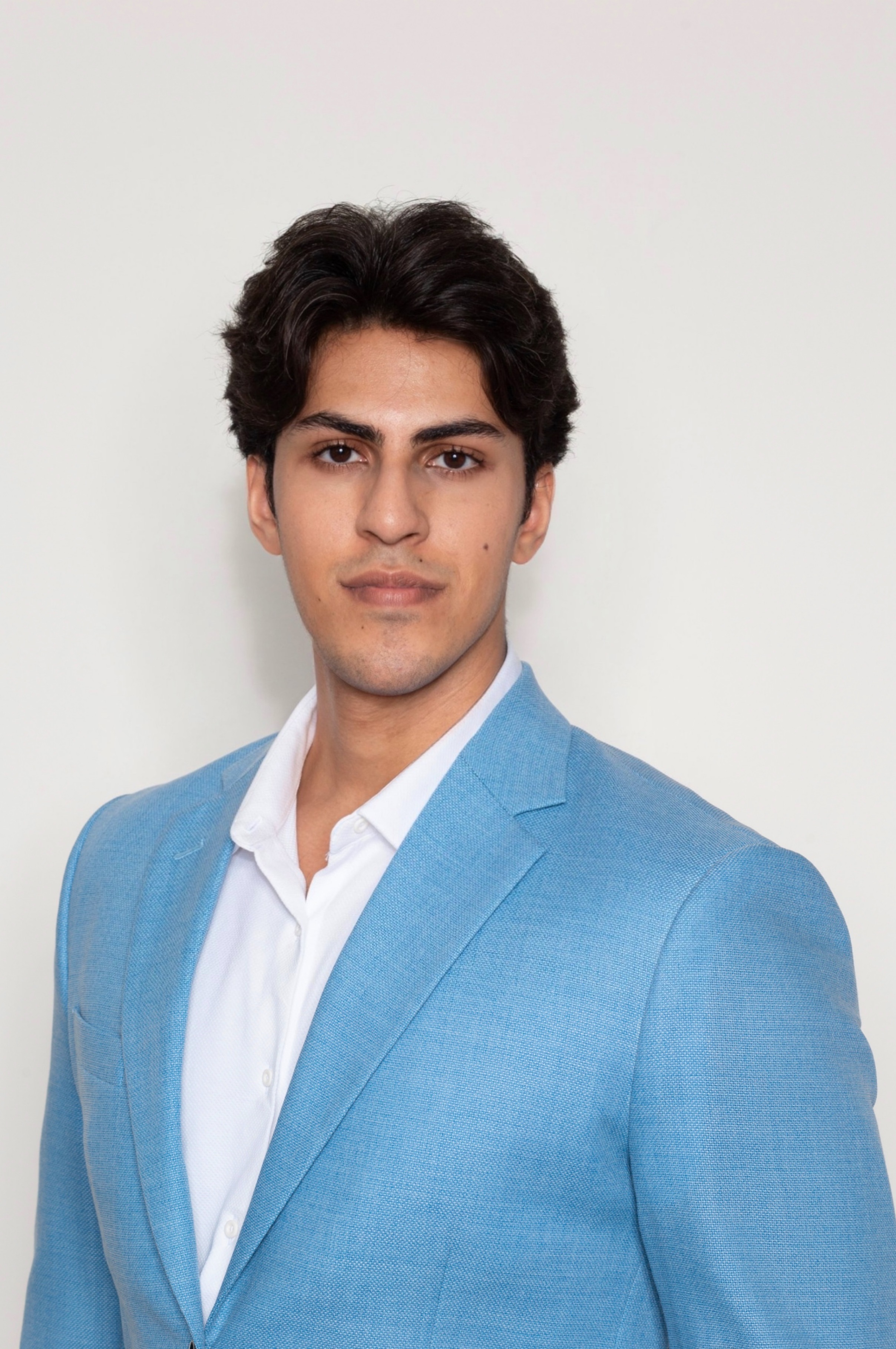 TAHA J. BHAT